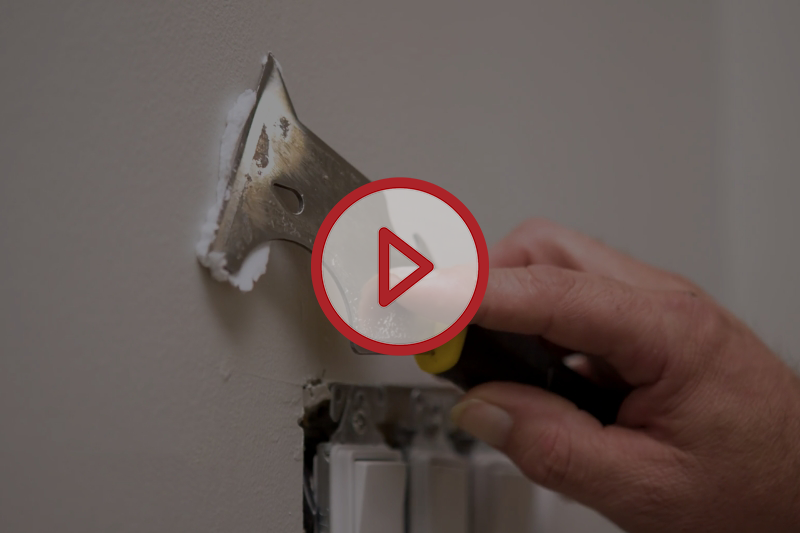 Video thumbnail of a person filling a hole in a wall using a multi-tool.