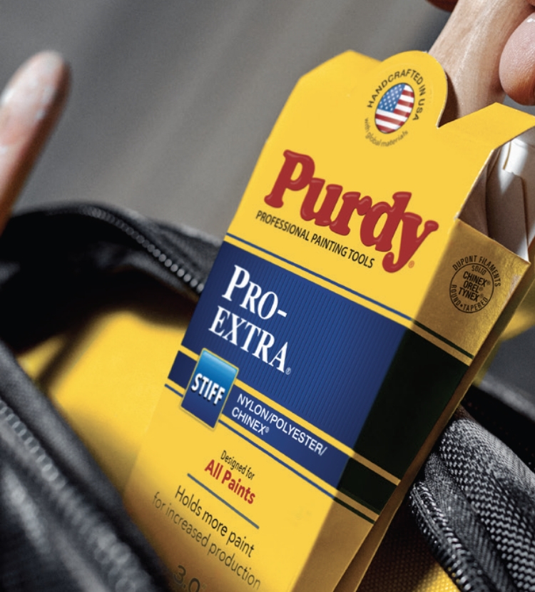 Taking Purdy Pro-extra brush out of the Purdy Painter’s Backpack.