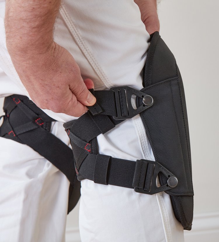 painter adjusting his knee pads