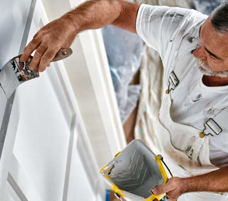 painter painting a door